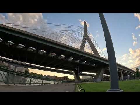 Sitting on bench Paul Revere Park - Boston MA Neighborhoods - Boats Train Zakim - North Station